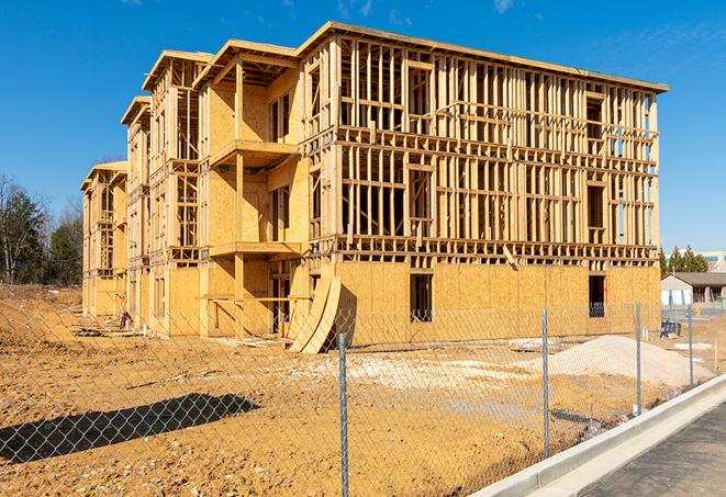 a snapshot of temporary chain link fences protecting a large construction project from unauthorized access in Perkins